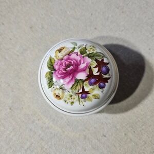 Floral white and pink ceramic trinket‎ music box